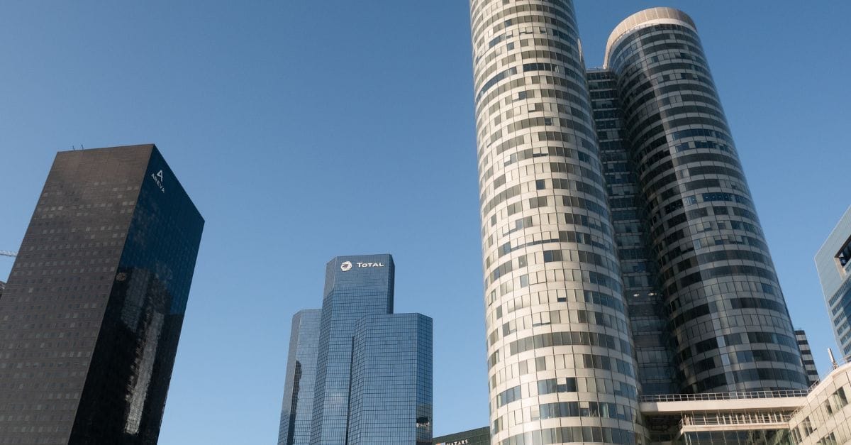 La Défense, Paris, buildings against a blue sky.