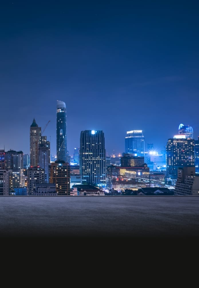 Bangkok urban cityscape skyline night scene with empty asphalt floor on front