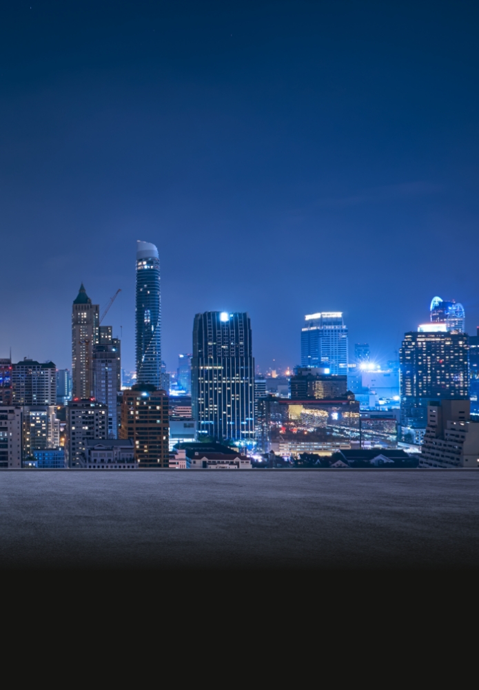 Bangkok urban cityscape skyline night scene with empty asphalt floor on front