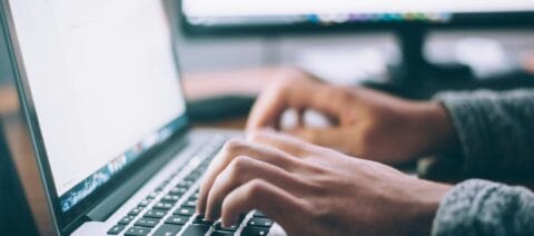 Financial professionals analyzing dashboards to overcome complexity in reconciliation using NeoXam Aro.